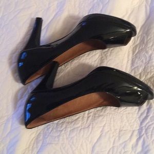 Clark’s black patent leather peep toe heels